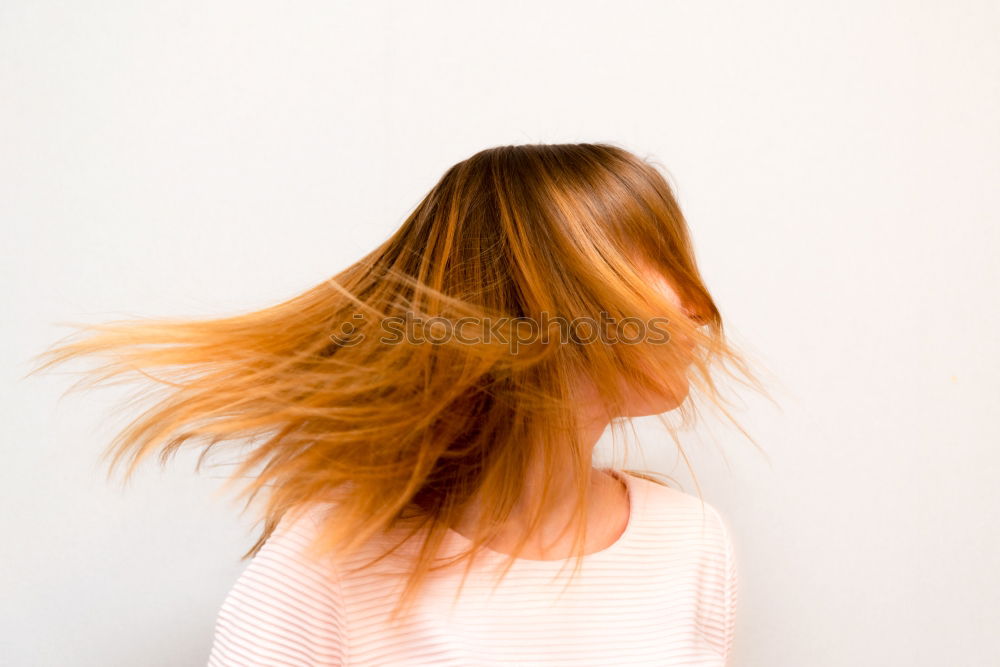 Similar – Woman with blown away hair