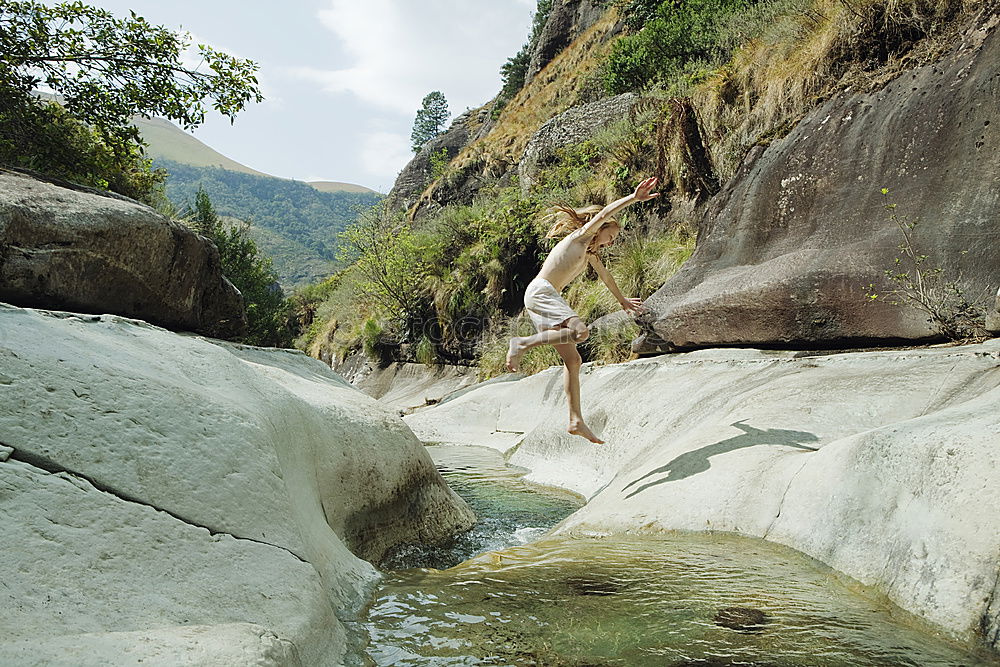 Similar – Image, Stock Photo Woman posing on tropical stream