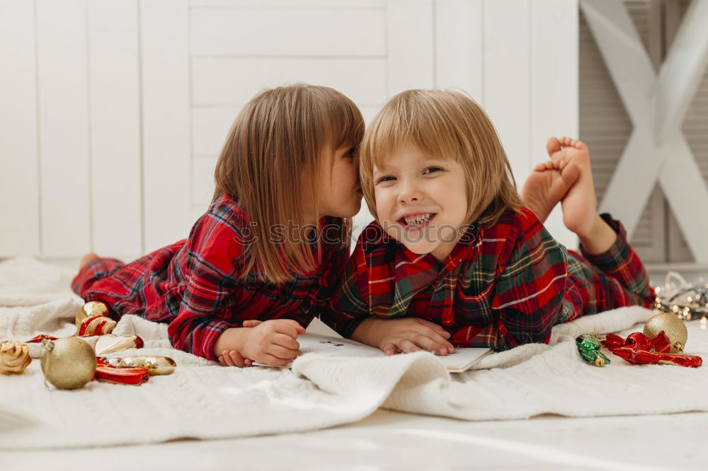 Similar – Family decorating baked Christmas gingerbread cookies with frosting