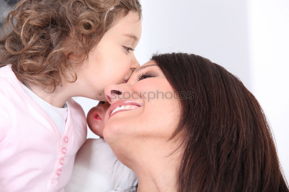 Similar – Image, Stock Photo Beautiful mother and daughter touching each other with their noses. Lovely family portrait