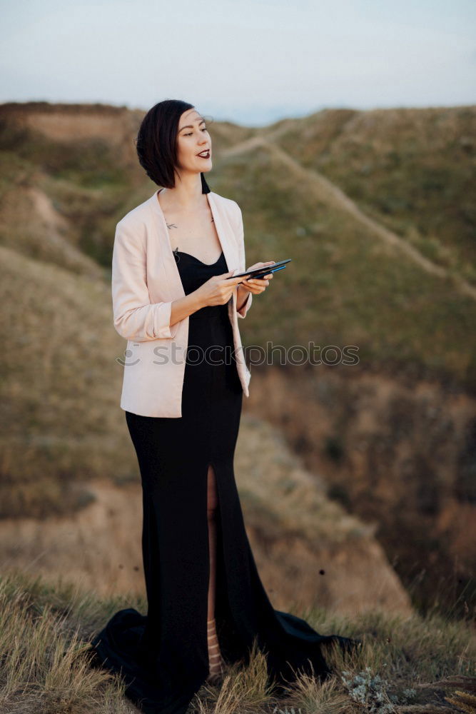 Similar – Pretty Asian woman sitting at pond