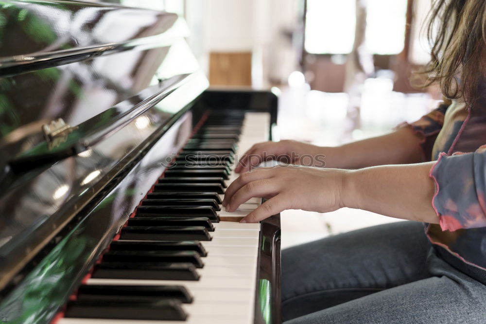 Similar – Image, Stock Photo young woman holding playing piano at home