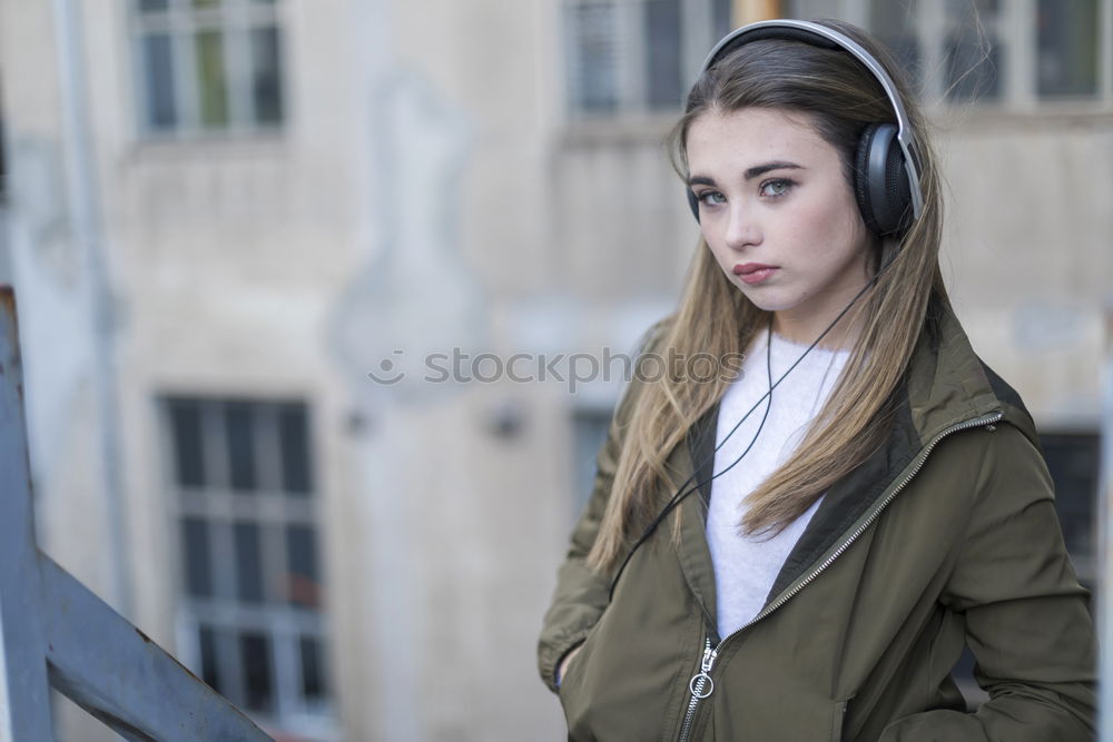 Similar – Image, Stock Photo Young girl with headphones standing on the street