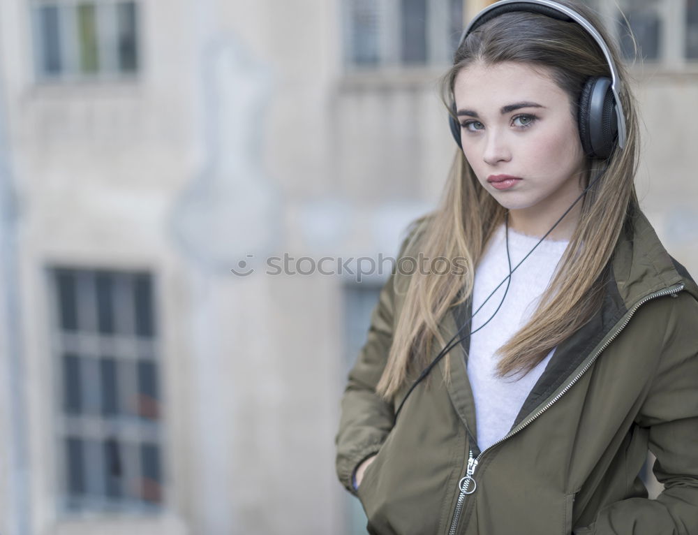 Similar – Image, Stock Photo Young girl with headphones standing on the street