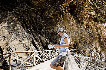 Similar – Image, Stock Photo Woman posing on tropical stream