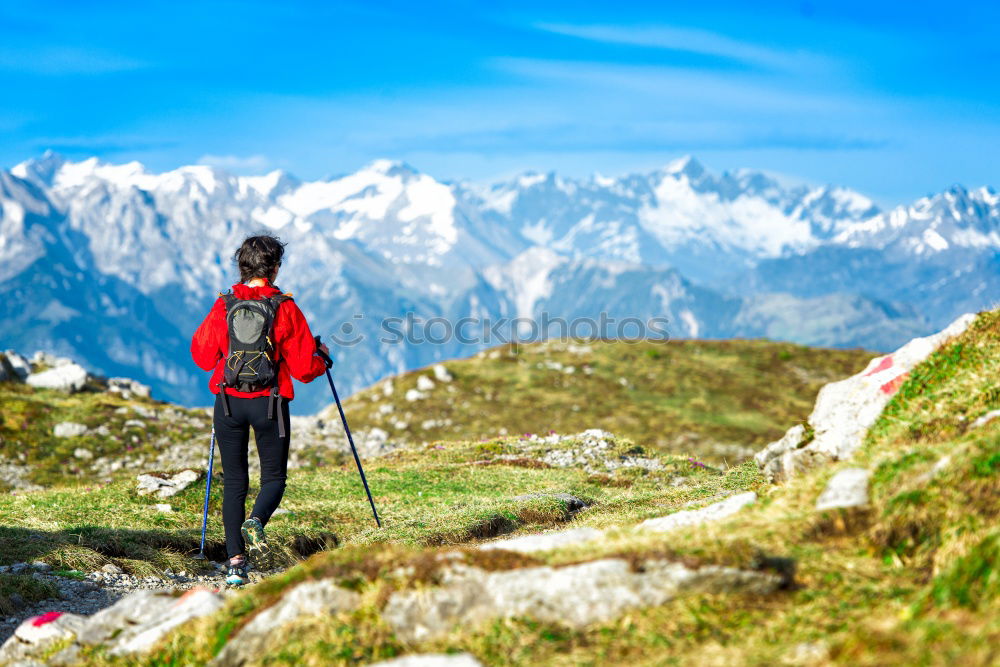 Similar – Foto Bild Frau mit Rucksack und Wanderstöcke