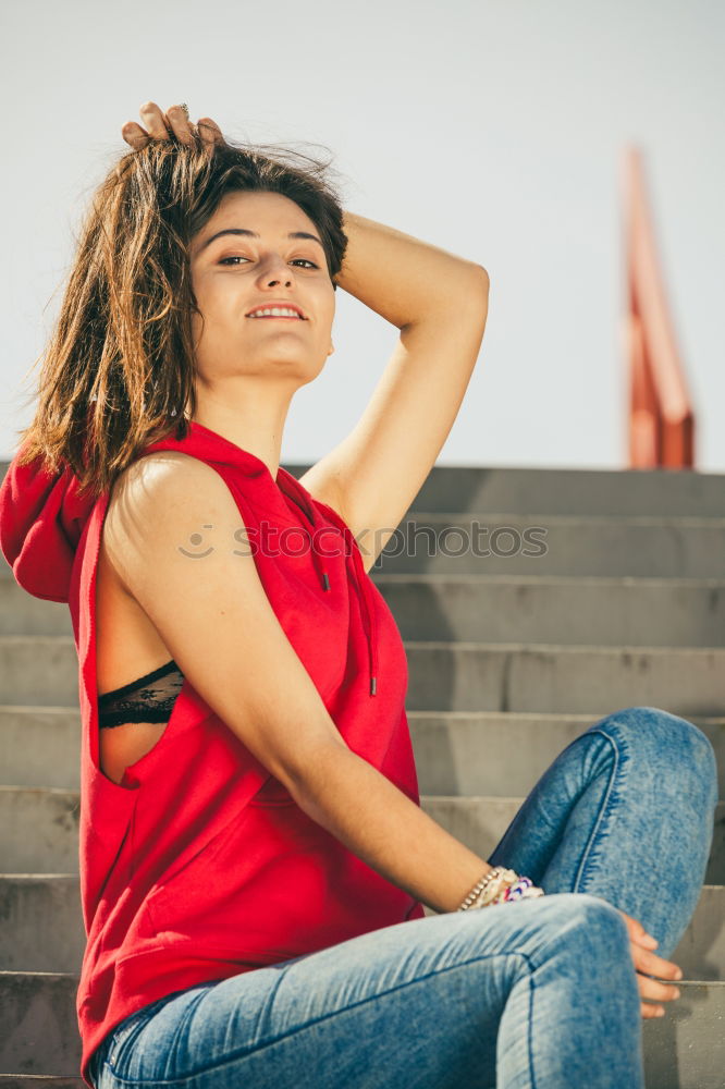 Similar – Image, Stock Photo African woman with black curly hairstyle sitting on urban floor.