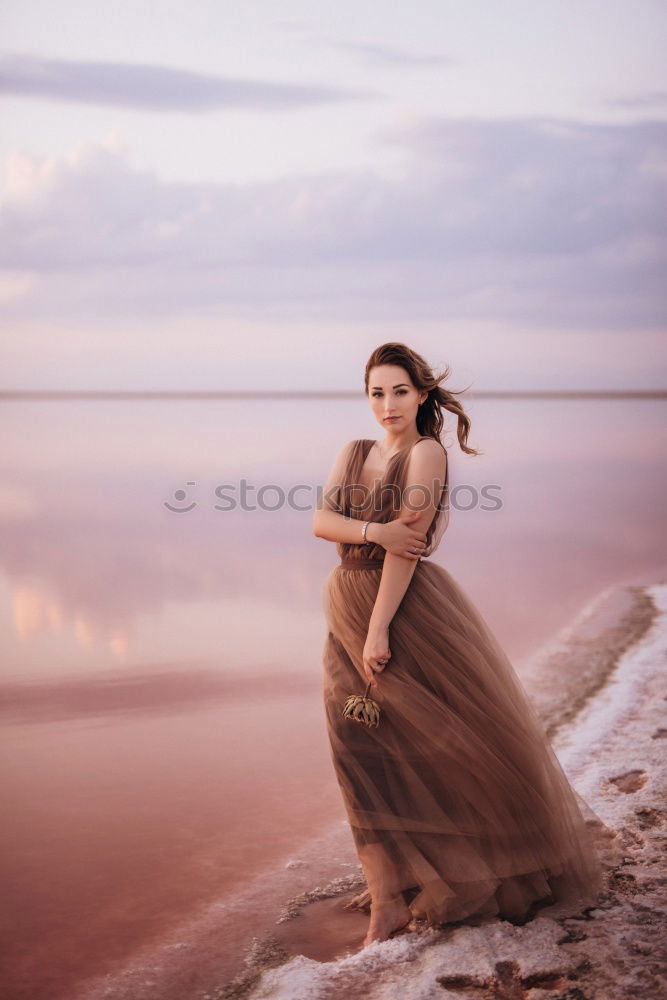 Similar – Pretty Asian woman sitting at pond