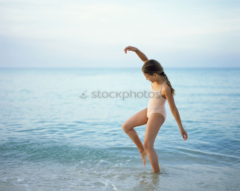 Similar – Young woman in a pool enjoying the water