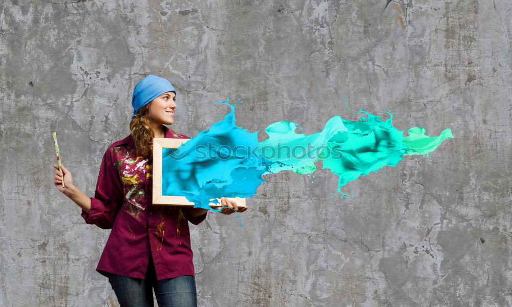 Similar – Woman with jacket jumps barefoot on blue rubber hills