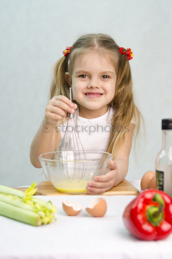 Similar – Image, Stock Photo child girl helps mom to cook