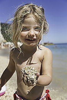 Similar – Image, Stock Photo Little girl holding starfish