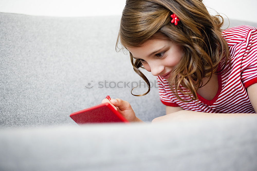 Similar – Image, Stock Photo Girl disguised as a butterfly reading with her doll