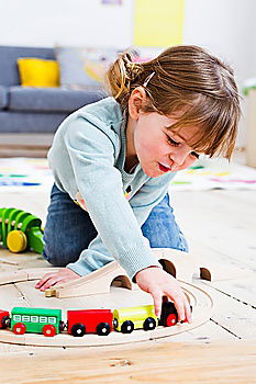 Similar – Image, Stock Photo Happy baby playing with toy blocks.