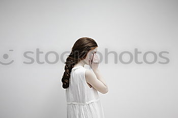 Similar – Image, Stock Photo Young redhead woman with a yellow dress in a yellow room