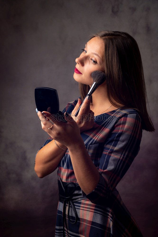 Similar – Image, Stock Photo Woman with grey dyed hair using her phone