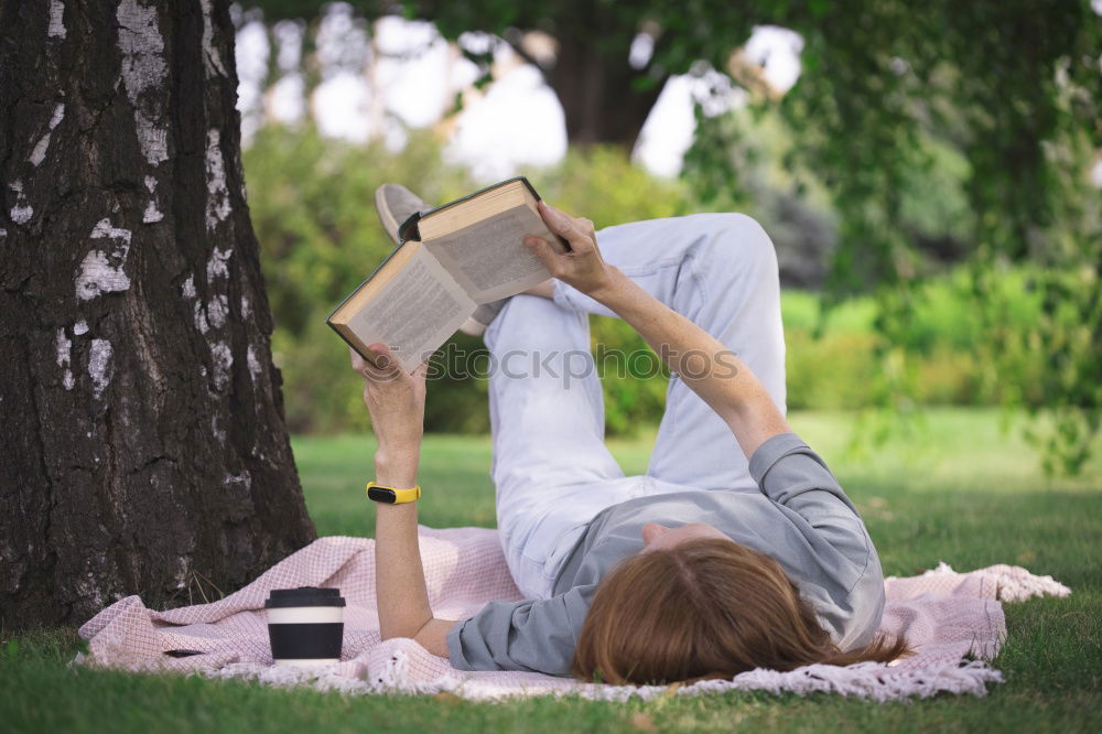 Similar – Image, Stock Photo Teen boy reading a book