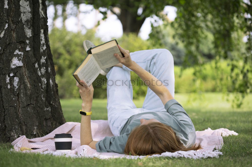 Similar – Image, Stock Photo Teen boy reading a book