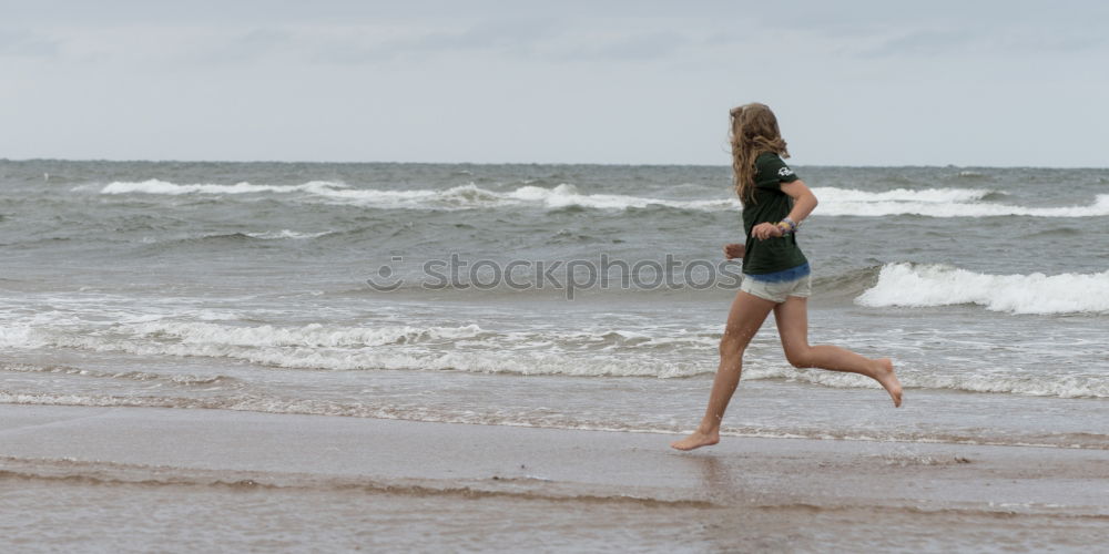 Similar – Girl at the Beach Ocean