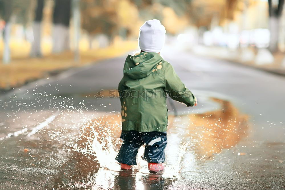 Similar – ihr Regenschirm ist wasserscheu