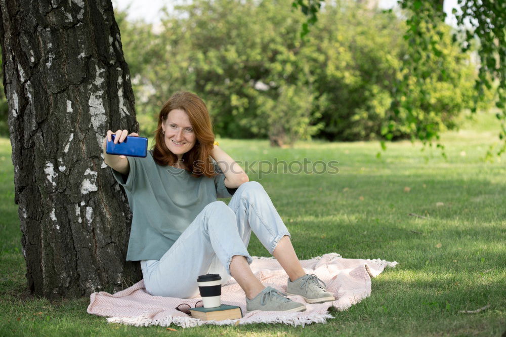 Similar – Image, Stock Photo Happy fit young woman does stretching workout on fitness mat practices yoga outside dressed in activewear has strong body breathes fresh air outdoor leads active lifestyle. Sport fitness concept