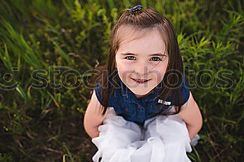 Similar – Image, Stock Photo Smiling girl between meadow with dry leaves