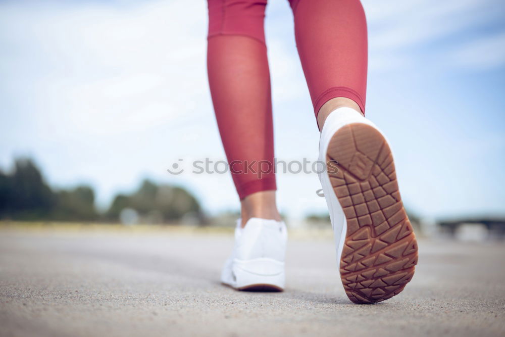 Similar – Image, Stock Photo Young woman jogging down an autumn street