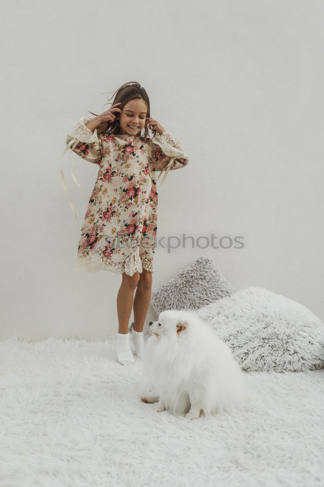 Similar – Image, Stock Photo afrcian girl giving teddy sweets at home