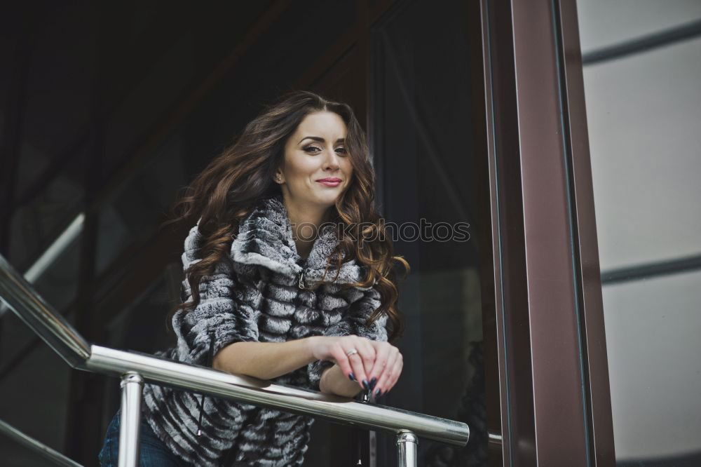 Similar – Young woman wearing casual clothes smiling in urban background