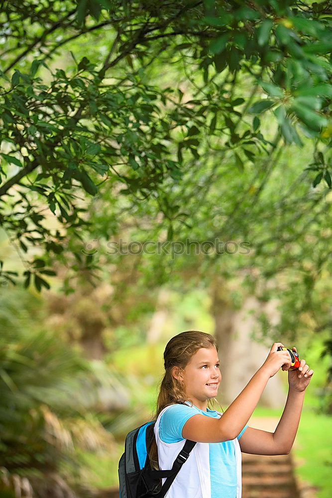 Woman doing trekking looking at camera