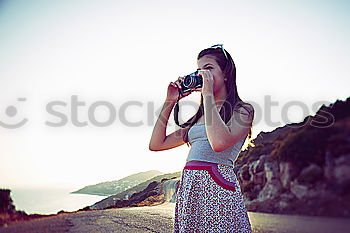 Similar – young woman with analog photo camera