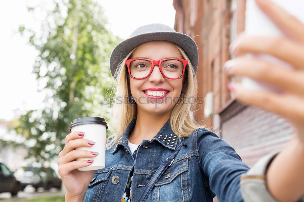 Similar – Image, Stock Photo Happy young woman with her mobile on the street