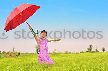 Similar – Image, Stock Photo Red umbrella woman