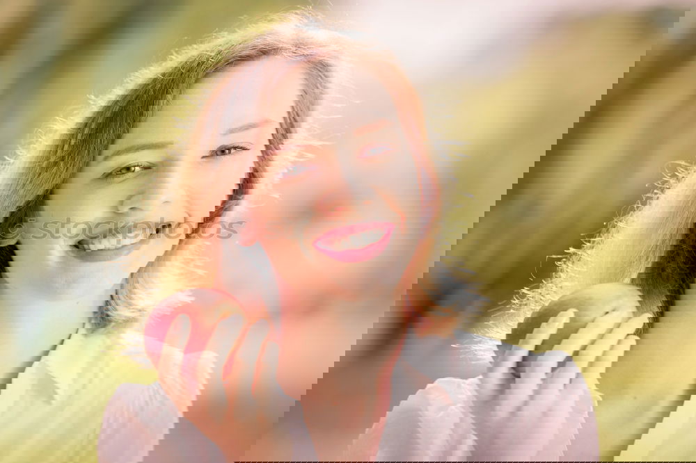 Image, Stock Photo Young woman bites an apple