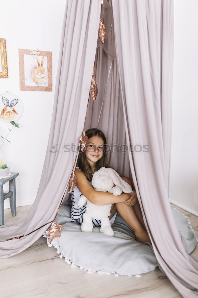 Similar – Image, Stock Photo African girl sits next to her teddy bear at home