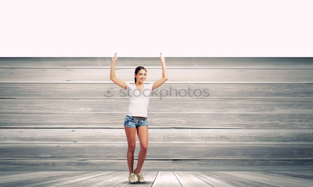 Similar – athletic woman doing her stretching routine