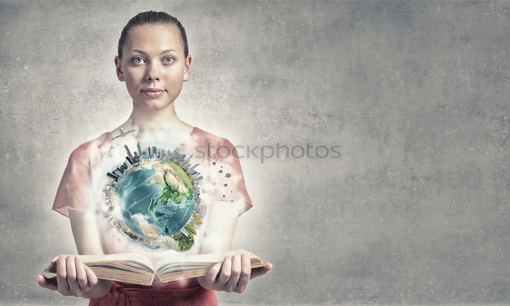 Similar – Girl sitting by the map in classroom