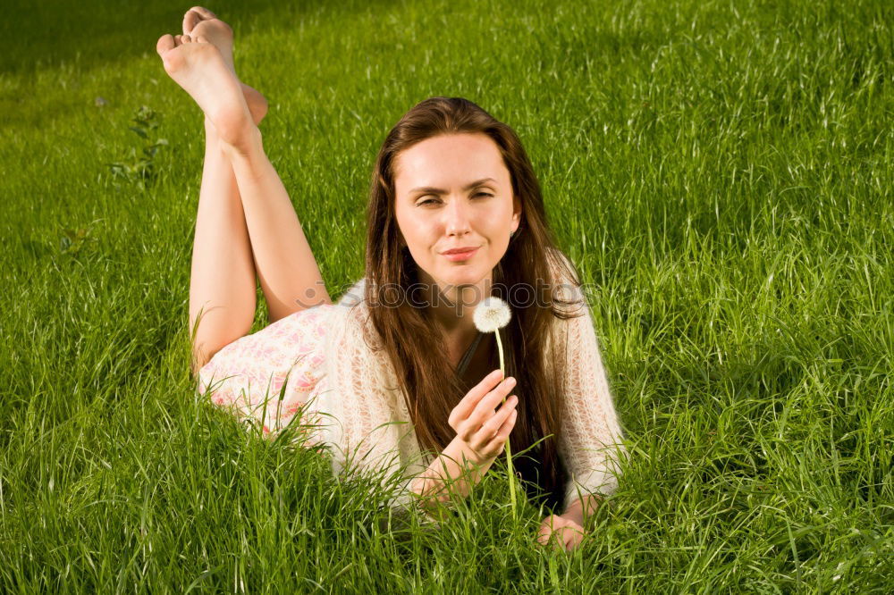 Similar – Girl in the grass Feminine