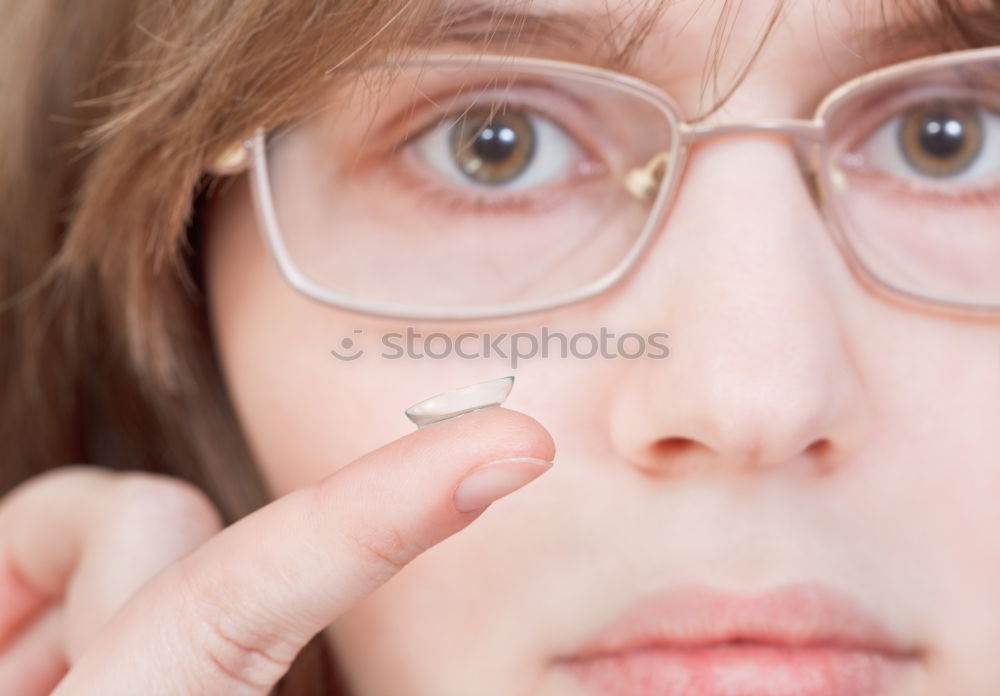 Similar – woman covering her eye with piece of sushi