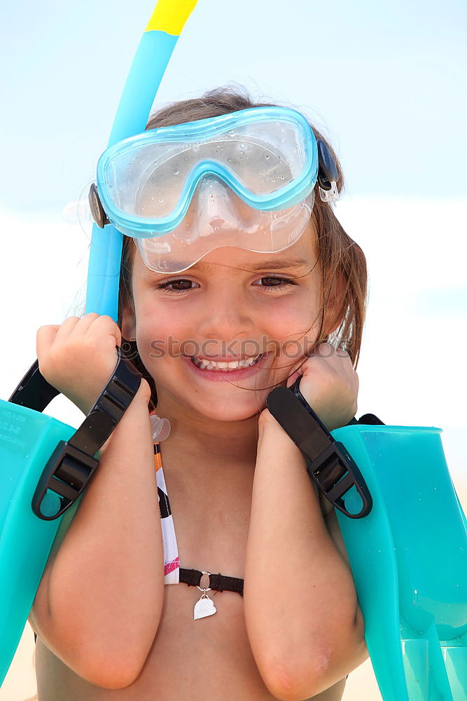 Similar – Kid in snorkel mask posing on poolside