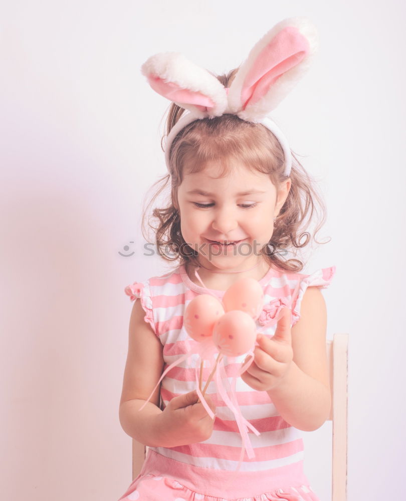 Similar – Little girl wearing rabbit ears