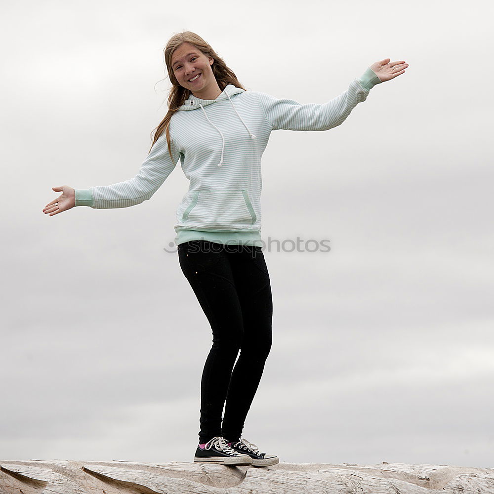 Similar – Young woman on the beach