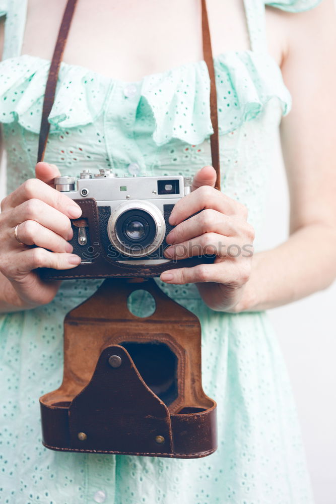 Similar – Image, Stock Photo Old vintage film camera in a leather case