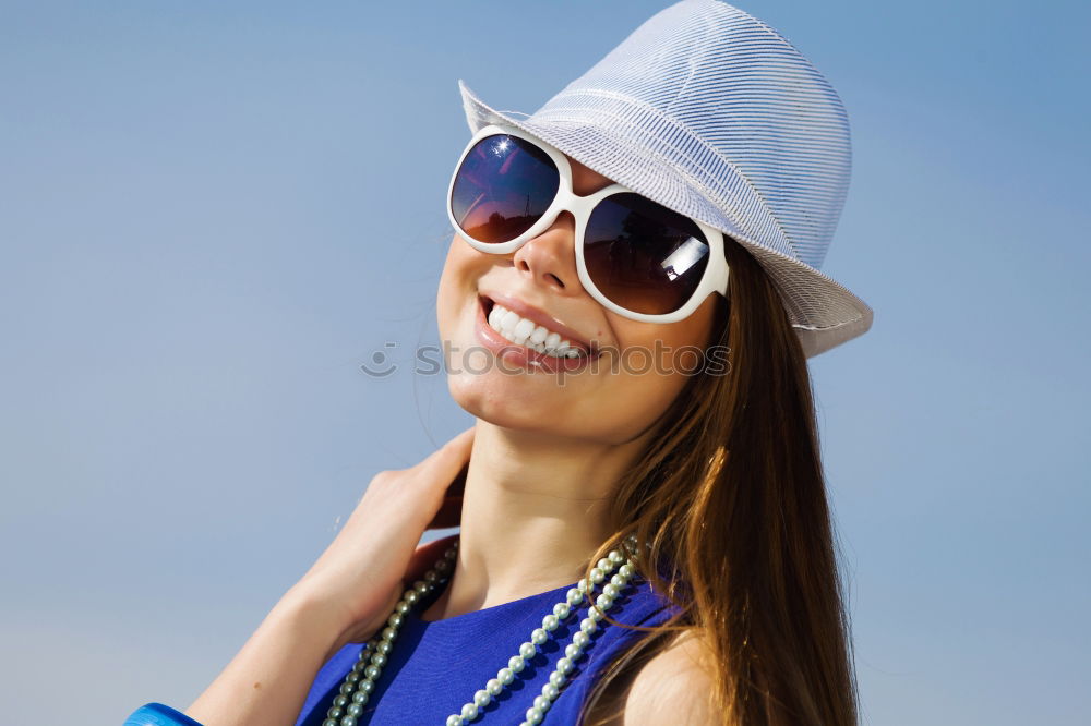 Similar – Woman with sunglasses