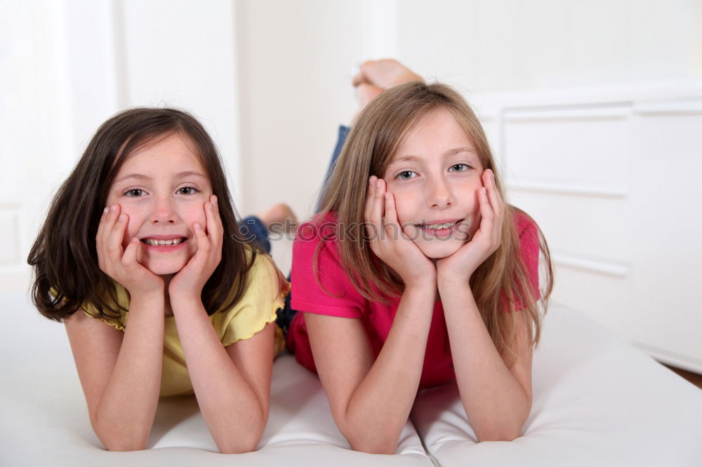 Similar – Image, Stock Photo two beautiful sisters playing at home