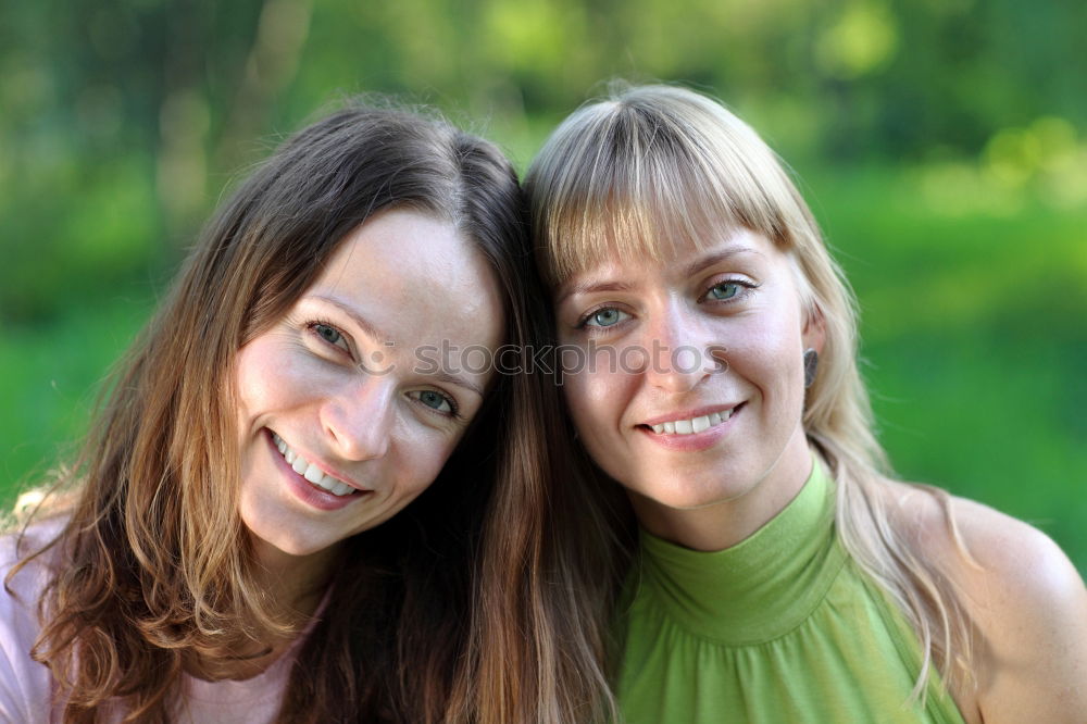 Similar – Portrait of two cheerful women