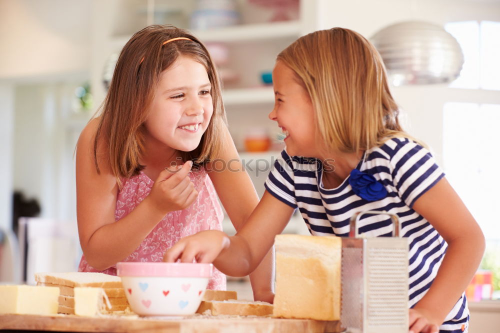 Image, Stock Photo Little sisters girl preparing baking cookies.