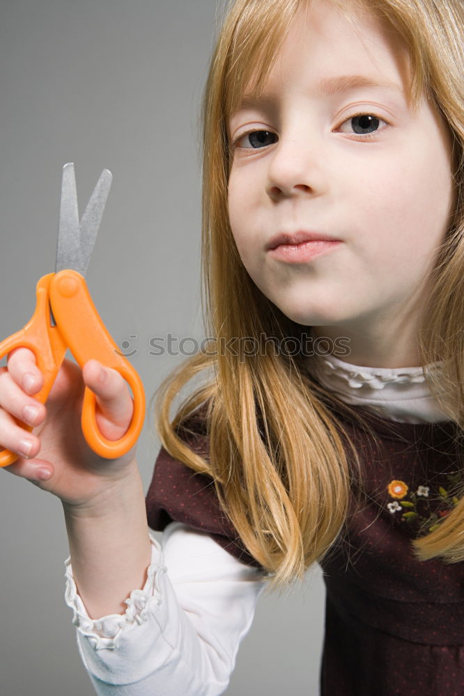 Similar – Child nibbles raspberries from his fingers