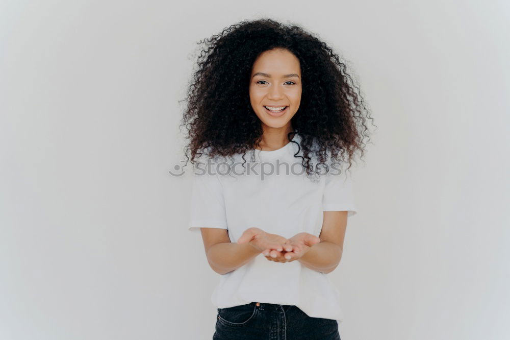 Similar – Young casual woman using her smartphone