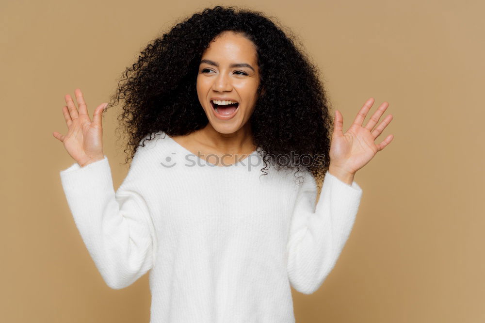 Similar – Young black woman with afro hairstyle smiling.